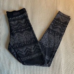 Nike Pro Dri-Fit leggings with gold logo